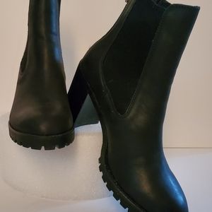 Black, gusseted, back zip, bootie.